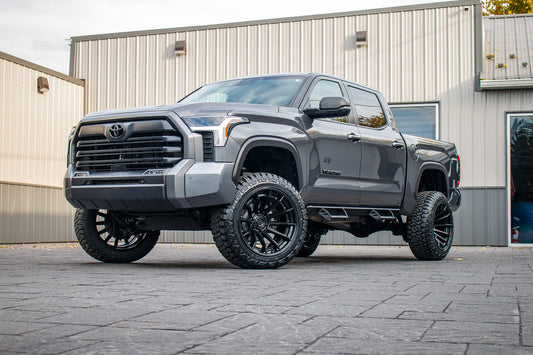 2024 Toyota Tundra SR with a 6" Rough Country lift kit, 22x12 Fuel Burn wheels, and 35" Fury Country Hunter R/T tires.