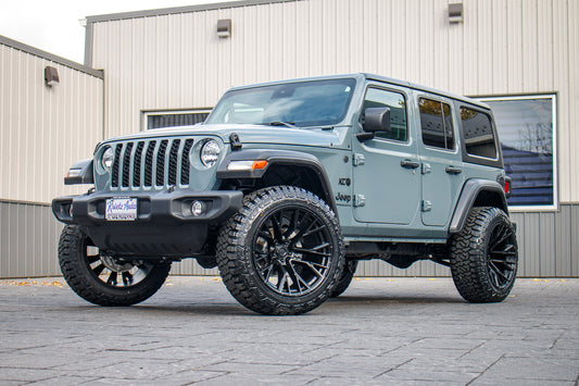 2024 Jeep Wrangler Sport with a 2.5" Rough Country lift kit, 22x12 Fuel Rebar wheels, and 35" Fury Country Hunter R/T tires.