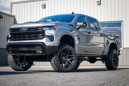 2025 Chevrolet Silverado 1500 with a 6" Rough Country lift kit, 22x12 Fuel Flux wheels, and 35" Fury Country Hunter R/T tires.