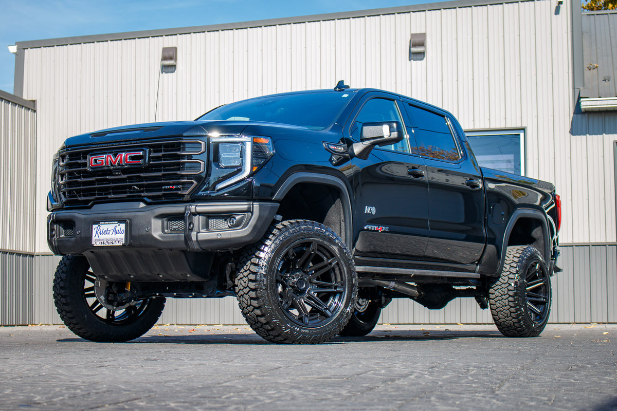 2024 GMC Sierra 1500 AT4X with a 4" ReadyLift lift kit, 22x12 Fuel Brawl wheels, and 35" Fury Country Hunter R/T tires.