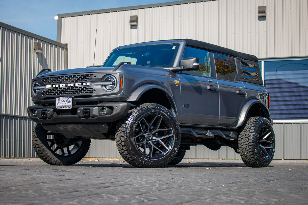 2023 Ford Bronco Badlands with a 3.5" Rough Country lift kit, 22x12 Fuel Flux wheels, and 35" Fury Country Hunter R/T tires.