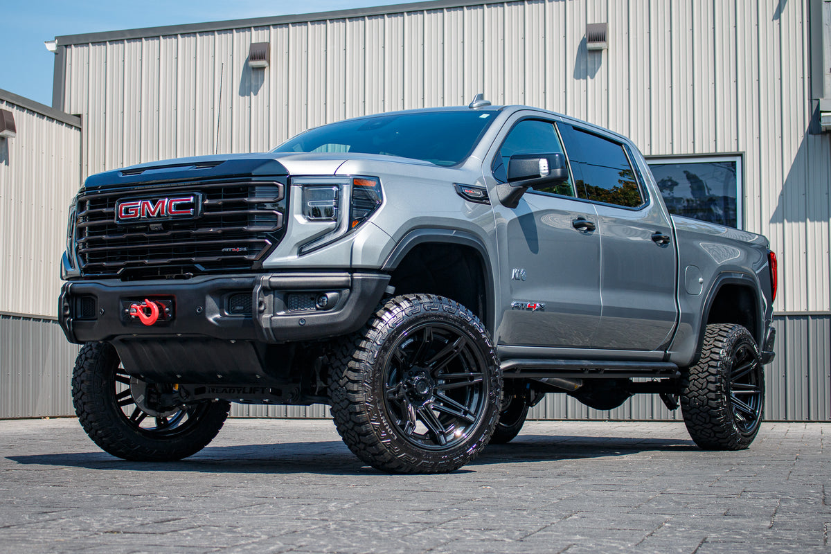 2023 GMC Sierra 1500 AT4X with a 4" ReadyLift lift kit, 22x12 Fuel Brawl wheels, and 35" Fury Country Hunter R/T tires.