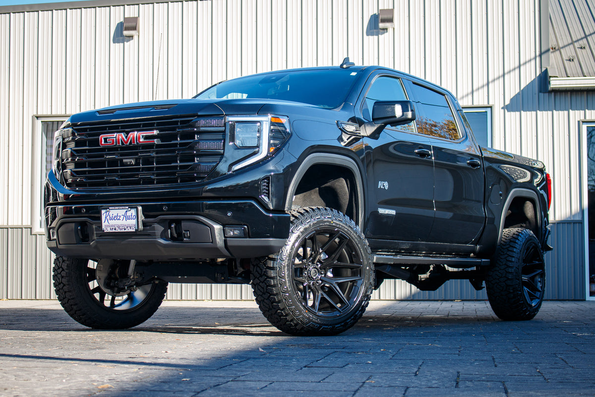 2024 GMC Sierra 1500 Elevation with a 6" Rough Country lift kit, 22x12 Fuel Flux wheels, and 35" Fury Country Hunter R/T tires.