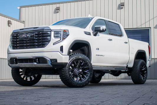 2024 GMC Sierra 1500 Denali Ultimate with a 6" Rough Country suspension kit, 22x12 Fuel Flame wheels, and 35" Fury Country Hunter R/T tires.