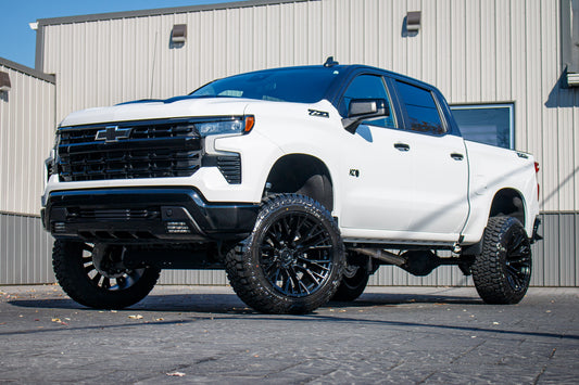 2025 Chevrolet Silverado 1500 LT Trail Boss with a 6" Rough Country lift kit, 22x12 Fuel Rebar wheels, and 35" Fury Country Hunter R/T tires.