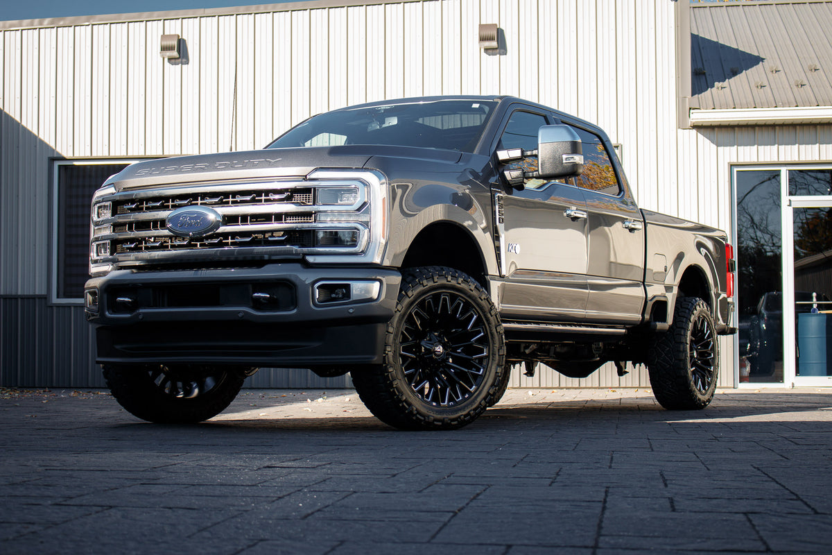 2024 Ford F-350 Super Duty Platinum with Ford Stock suspension, 22x10 Fuel Strike wheels, and 35" Fury Country Hunter R/T tires.