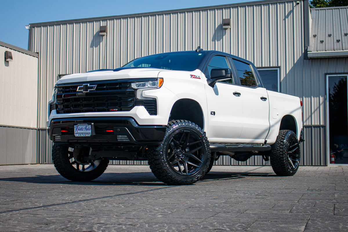 2022 Chevrolet Silverado 1500 LT Trail Boss with a 6" Rough Country lift kit, 22x12 Fuel Flux wheels, and 35" Fury Country Hunter R/T tires.