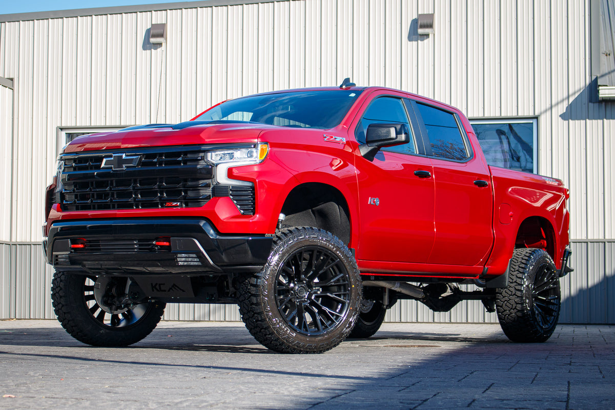 2025 Chevrolet Silverado 1500 LT Trail Boss with a 6" Rough Country lift kit, 22x12 Fuel Rebar wheels, and 35" Fury Country Hunter R/T tires.