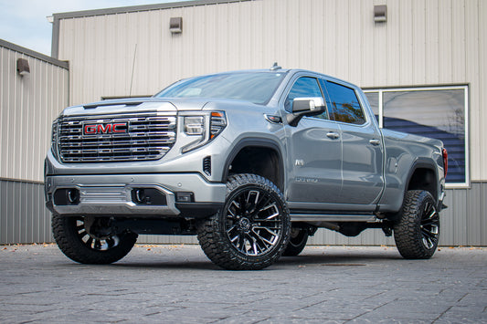 2024 GMC Sierra 1500 Denali with a 6" Rough Country suspension kit, 22x12 Fuel Rebar wheels, and 35" Fury Country Hunter R/T tires.