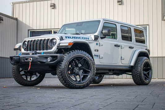 2024 Jeep Wrangler Unlimited Rubicon 4XE with a 2.5" Rough Country lift kit, 22x12 Fuel Flux wheels, and 35" Fury Country Hunter R/T tires.
