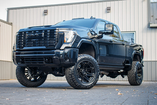 2024 GMC 2500 Denali Ultimate with a 5" BDS lift kit, 22x12 Fuel Brawl wheels, and 37" Nitto Ridge Grappler tires.