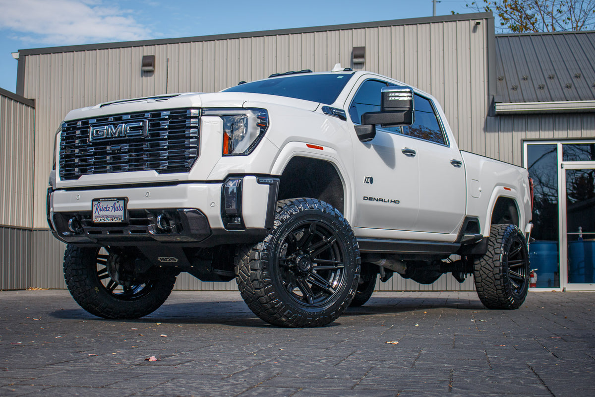 2024 GMC Sierra 2500 Denali Ultimate with a 5" BDS lift kit, 22x12 Fuel Brawl wheels, and 37" Nitto Ridge Grappler tires.