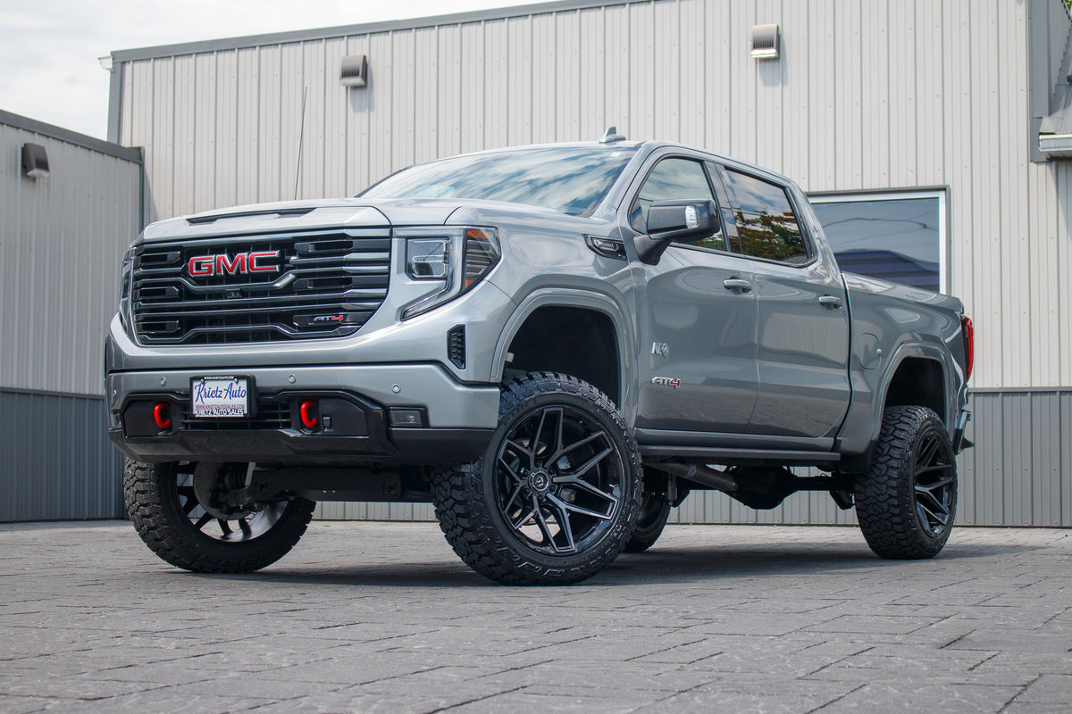 2024 GMC Sierra 1500 AT4 with a 6" Rough Country lift kit, 22x12 Fuel Flux wheels, and 35" Fury Country Hunter R/T tires.