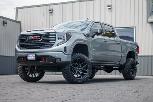 2024 GMC Sierra 1500 AT4 with a 6" Rough Country lift kit, 22x12 Fuel Flux wheels, and 35" Fury Country Hunter R/T tires.