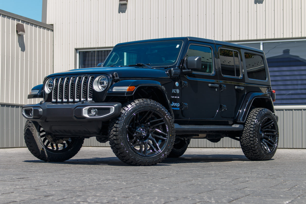 2021 Jeep Wrangler Unlimited Sahara 4XE with a 2.5" Rough Country lift kit, 22x12 Fuel Typhoon wheels, and 35" Fury Country Hunter R/T tires.