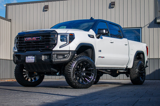 2024 GMC Sierra 1500 AT4X with a 4" ReadyLift lift kit, 22x12 Fuel Flame wheels, and 35" Fury Country Hunter R/T tires.