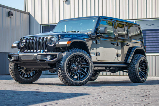 2021 Jeep Wrangler Unlimited Rubicon 4XE with Jeep Stock suspension, 22x12 Fuel Typhoon wheels, and 35" Fury Country Hunter R/T tires.