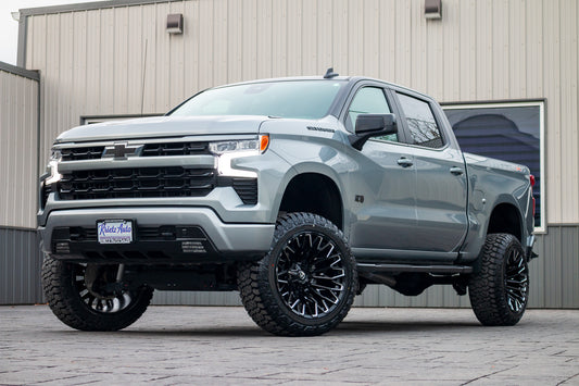 2024 Chevrolet Silverado 1500 RST with a 6" Rough Country lift kit, 22x12 Fuel Strike wheels, and 35" Fury Country Hunter R/T tires.