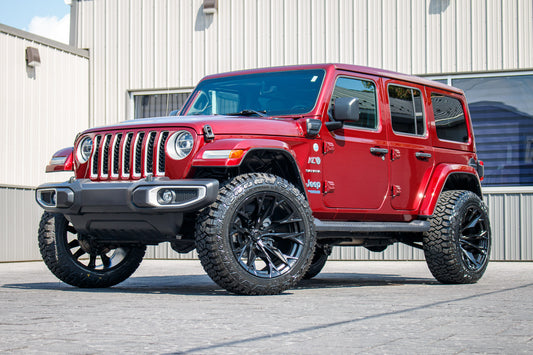 2021 Jeep Wrangler Unlimited Sahara 4XE, 22x12 Fuel Flame wheels, and 35" Fury Country Hunter R/T tires.