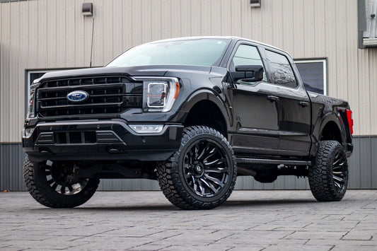 2022 Ford F-150 Lariat with a 6" Rough Country lift kit, 22x12 Fuel Blitz wheels, and 35" Fury Country Hunter R/T tires.