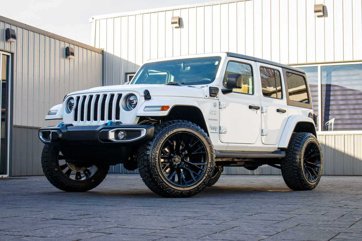 2023 Jeep Wrangler Sahara 4XE with a 2.5" Rough Country lift kit, 22x12 Fuel Rebar wheels, and 35" Fury Country Hunter R/T tires.