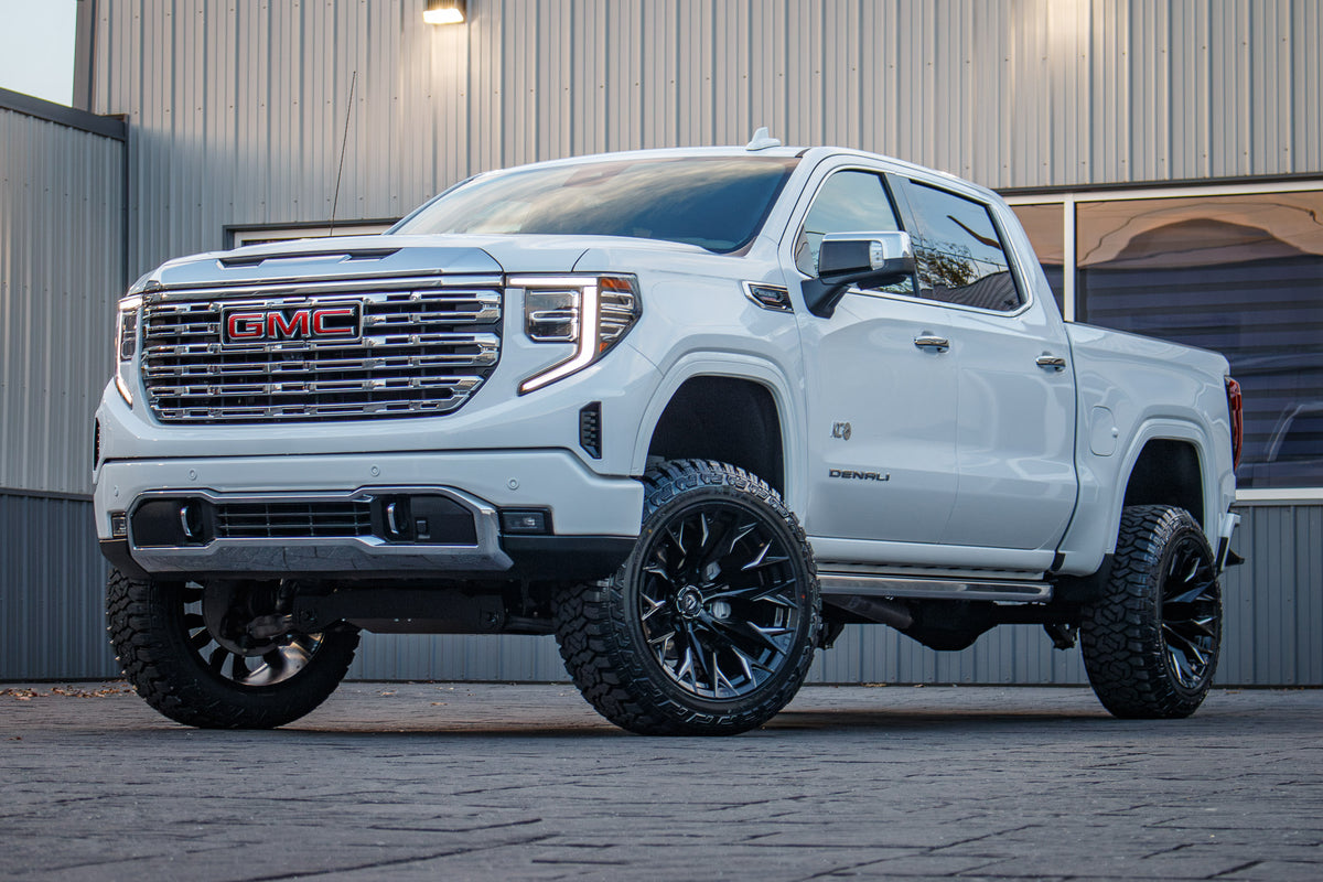 2024 GMC Sierra 1500 Denali with a 6" Rough Country suspension kit, 22x12 Fuel Flame wheels, and 35" Fury Country Hunter R/T tires.