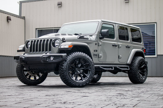 2022 Jeep Wrangler Unlimited Sahara with a 2.5" Rough Country lift kit, 22x12 Fuel Flame wheels, and 35" Fury Country Hunter R/T tires.