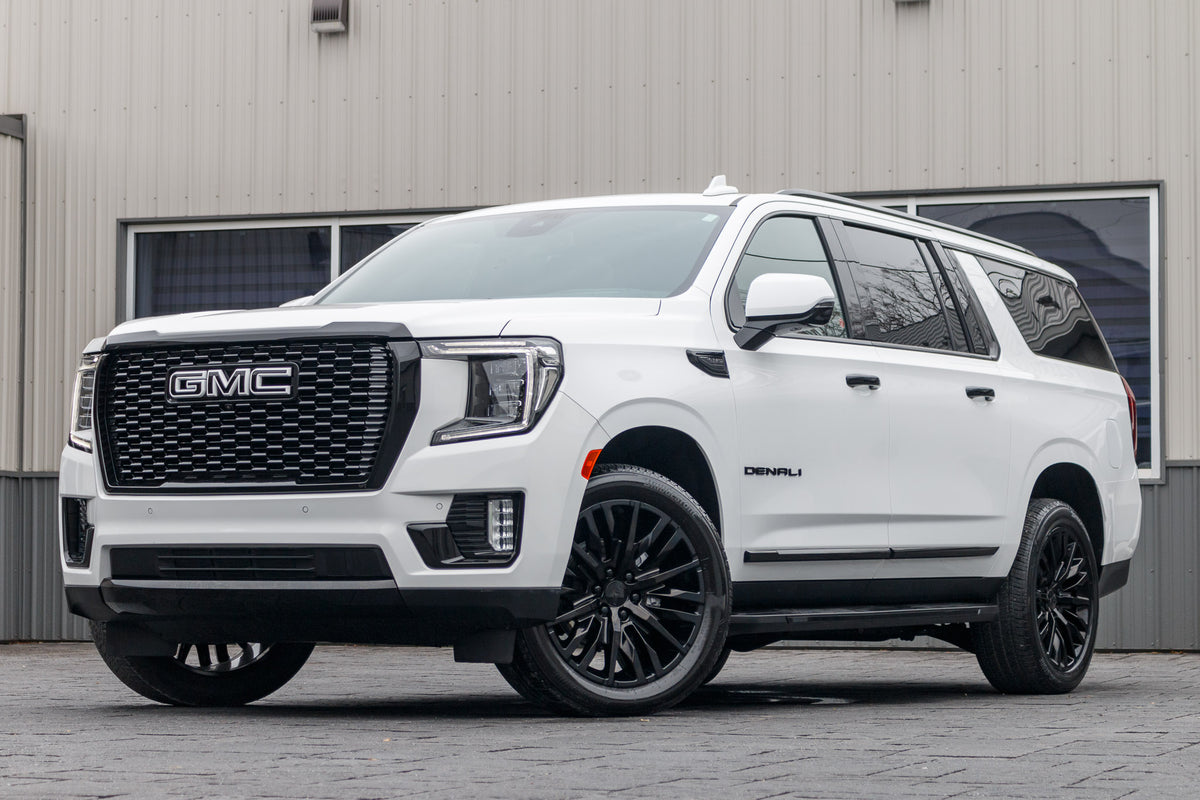 2024 GMC Yukon XL Denali with GMC Factory suspension, 22x9 GMC Stock wheels, and Bridgestone Alenza tires.